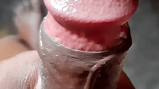 A youth south asian man is satisfying his urges in his residence.