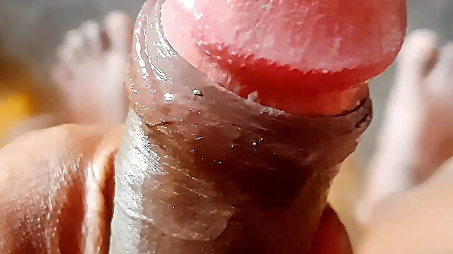 An Indian youth is practicing self-gratification in his private space.