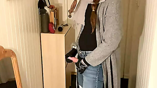 Femboy in tight jeans and hunter boots