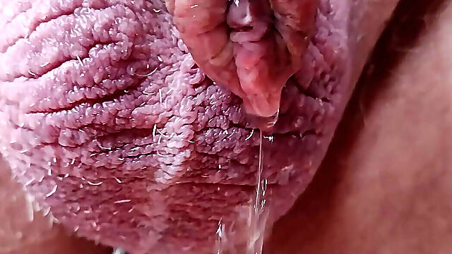 Tingle addiction PT.3 long slow closeup piss through puffy foreskin