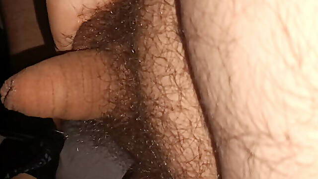 Chubby man masturbating his small dick in bed