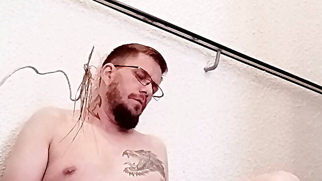 The fat fingers herself and braces herself on the stairs