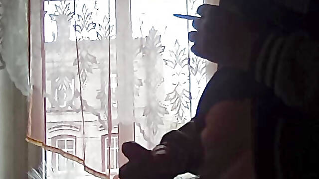 Elevationism in front of the window