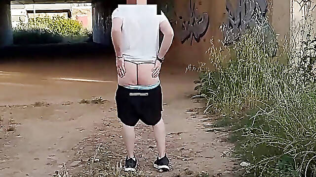 In Showing Her Ass in a Thong