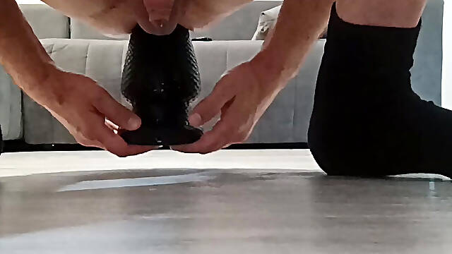 X-Men Buttplug Extralarge probing the depths of the hole