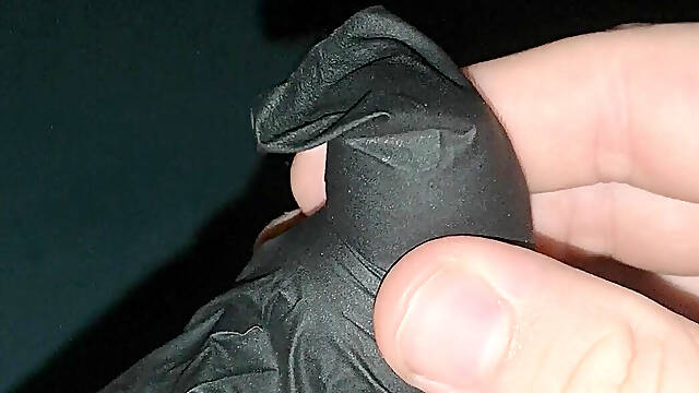 Cumming into a latex glove