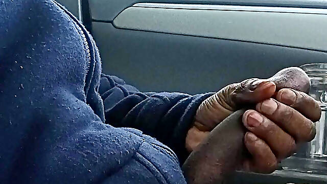 Stroking big black dick in car when no one is looking