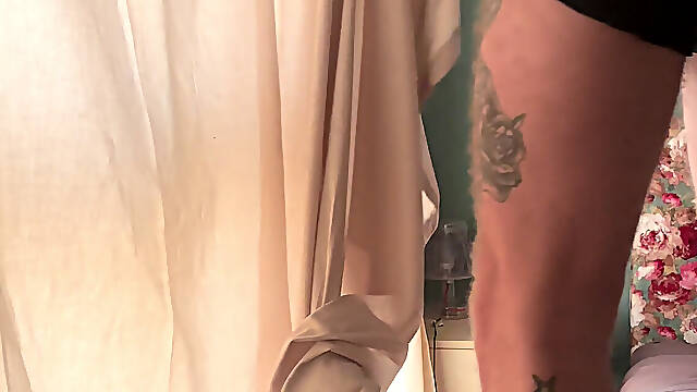 Dick slips out of sports nylon shorts