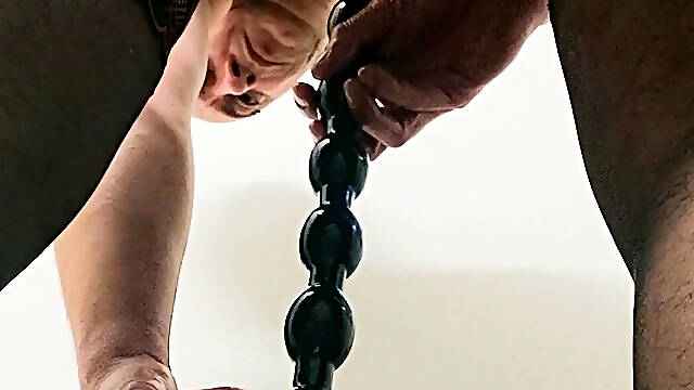 Anal stimulation performed in lingerie