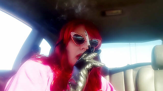 Mature Redhead Wearing LeatherGloves -Holder Smoking VS120 in Car