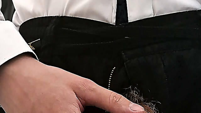 Man with a thick hairy cock pissing