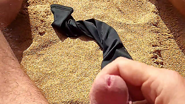 Ladysilva jerking off his big hot cock until he grasps on the deserted beach