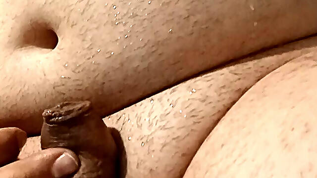 Small cock pisses and cum