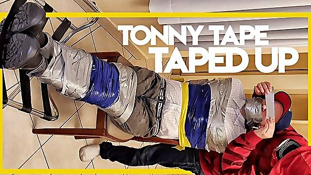 Tonny Tape taped up at the chair (1080p) Gay Bondage - Gay Domination - Tape Bondage - Handgag - Boots - Gagged - BDSM