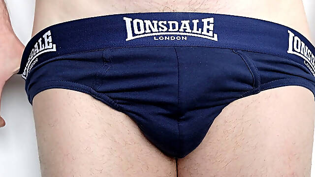 Close up on crotch in navy blue briefs slips out furry floppy wood, plays with foreskin as he wanks his man-meat becomes semi erect